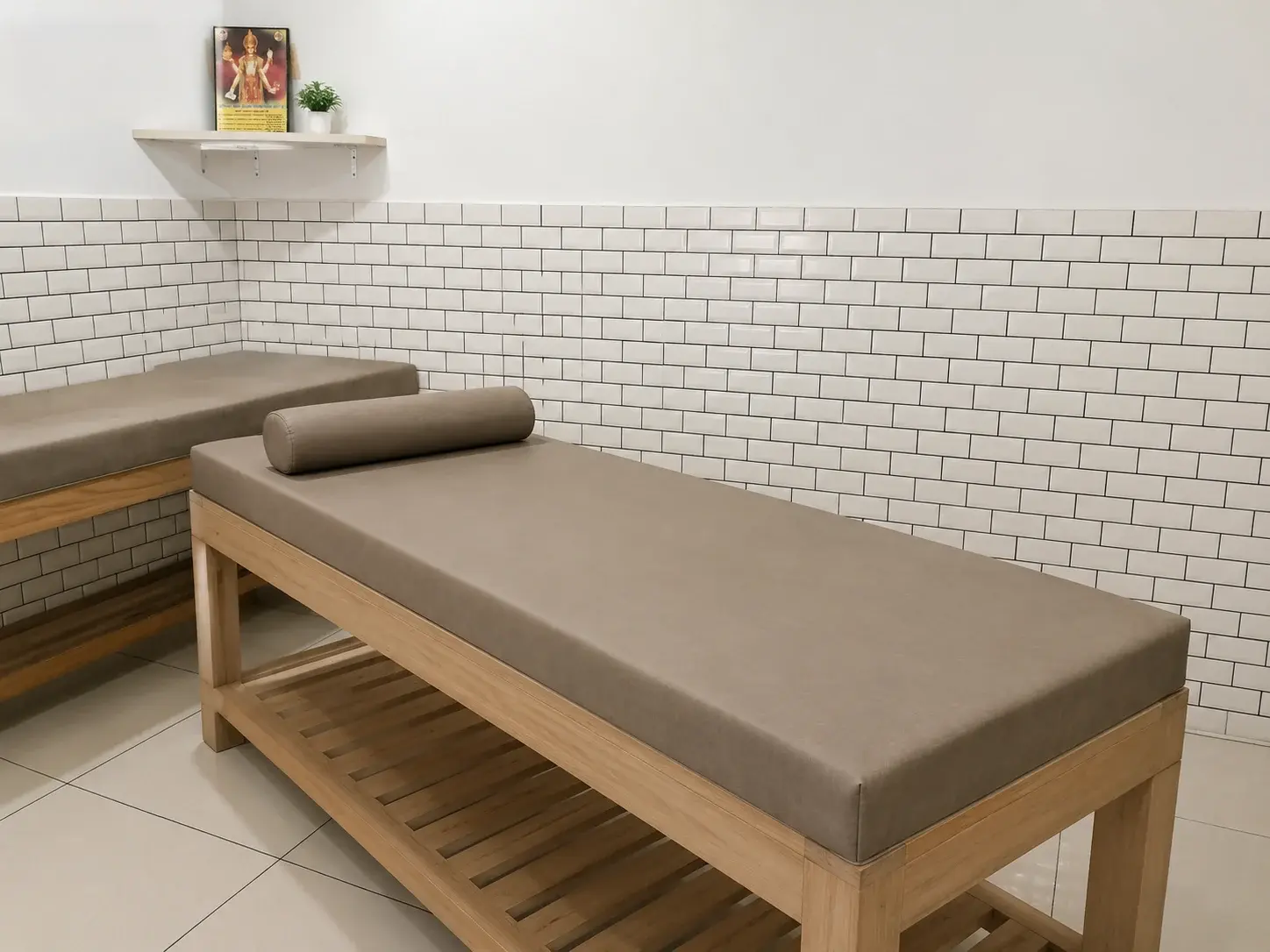 Therapy room treatment table at Manoveda Hospital Shamli